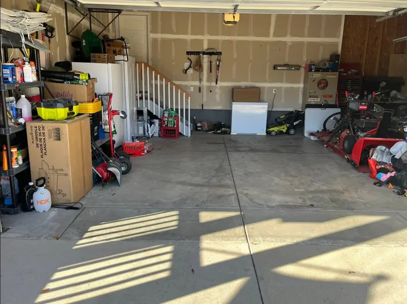Garage space after the refrigerator and dishwasher were removed