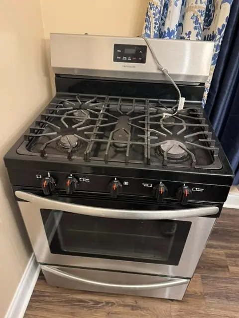 Gas kitchen range before appliance removal