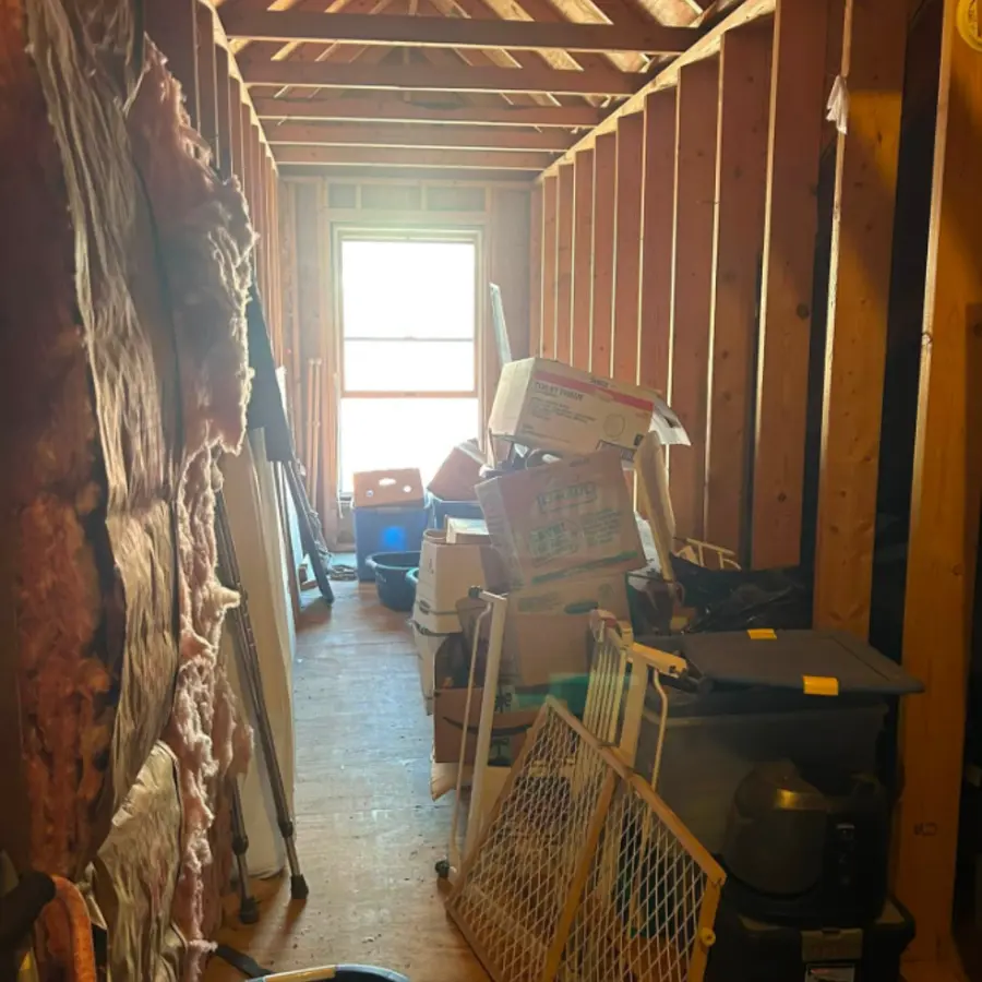 Attic with furniture before cleanout