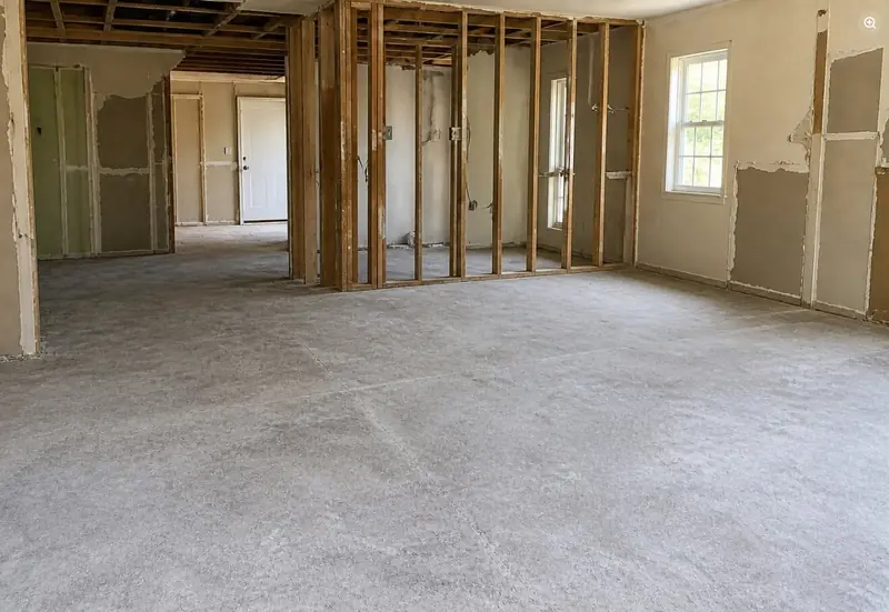 Interior renovation space cleared after construction debris removal