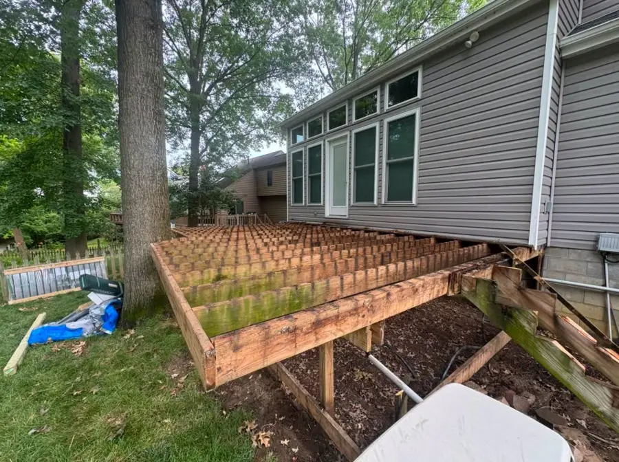Large deck after decking and railing were removed