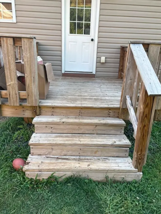 Small wood entry deck and steps before removal