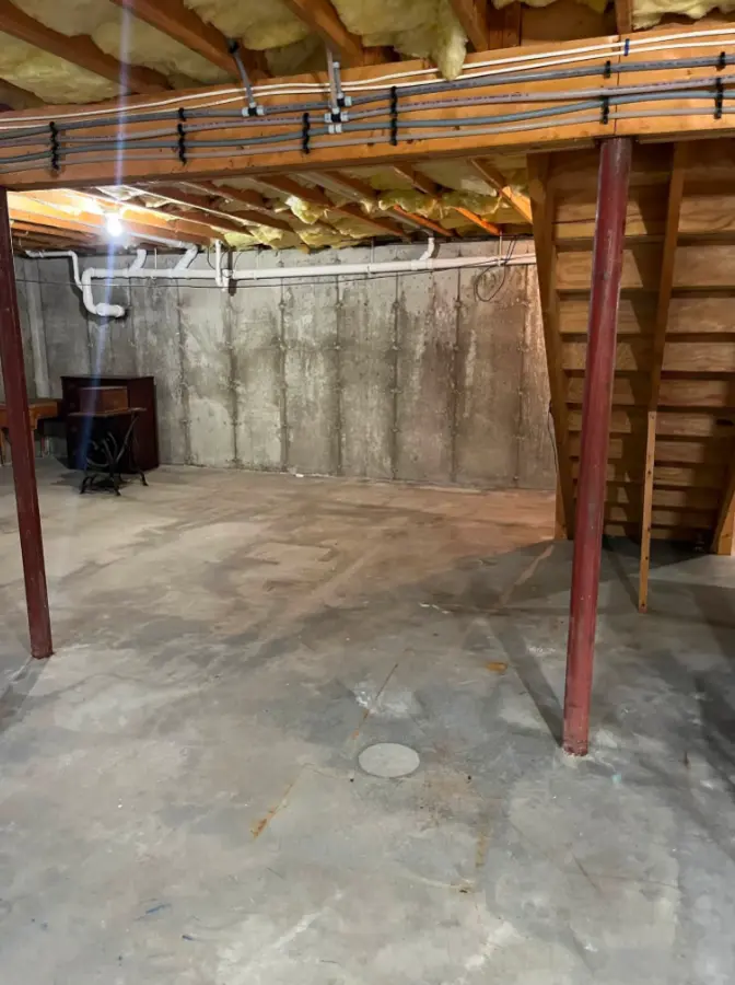 Basement floor cleared after furniture removal