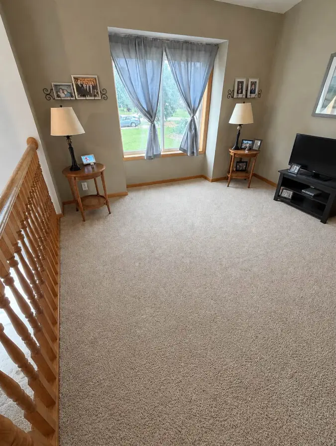 Open living room after sofas and chairs were removed