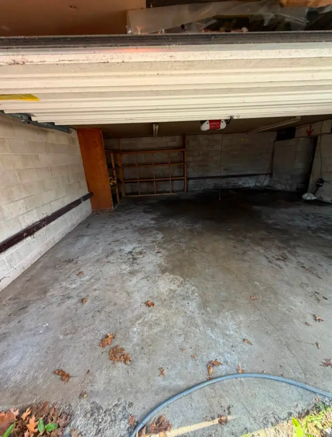 Concrete block garage cleared after junk removal