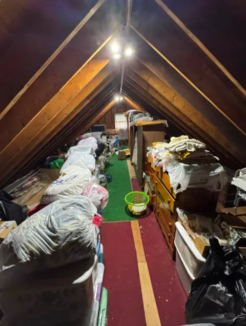 Packed attic before a JRT cleanout