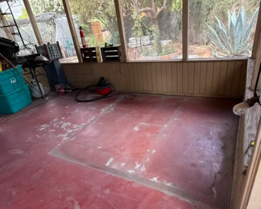 Screened porch cleared after hot tub removal