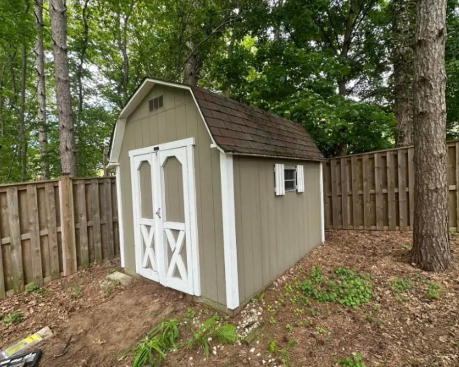 Backyard storage shed before demolition