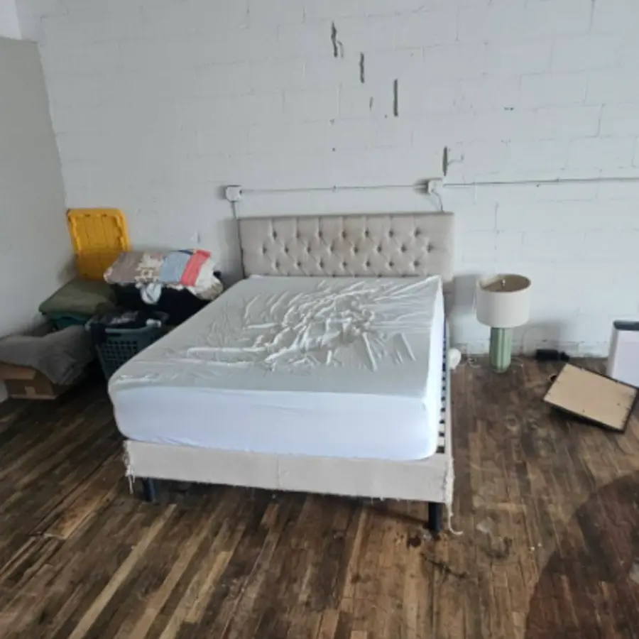 Twin mattress and bed before removal